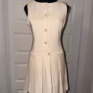 Meshki Cream Pleated Mini Dress – Elegant & Timeless